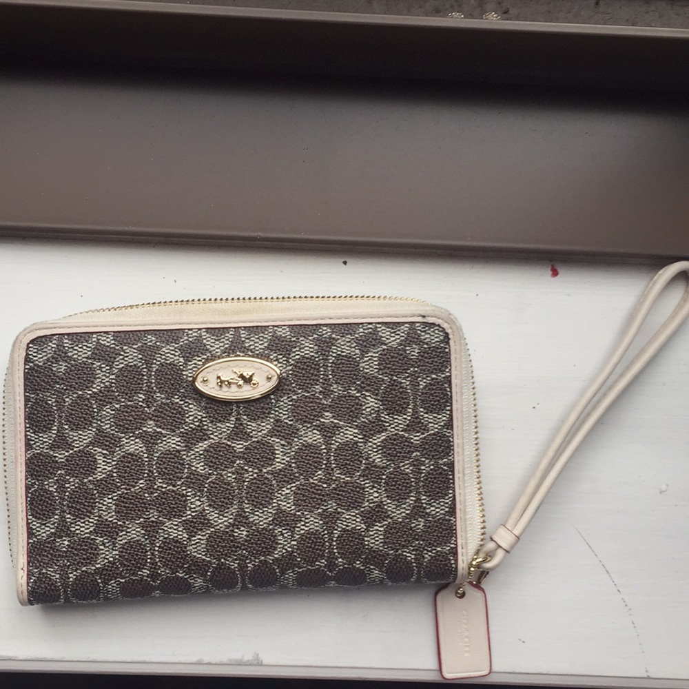 Coach tan wallet with red interior